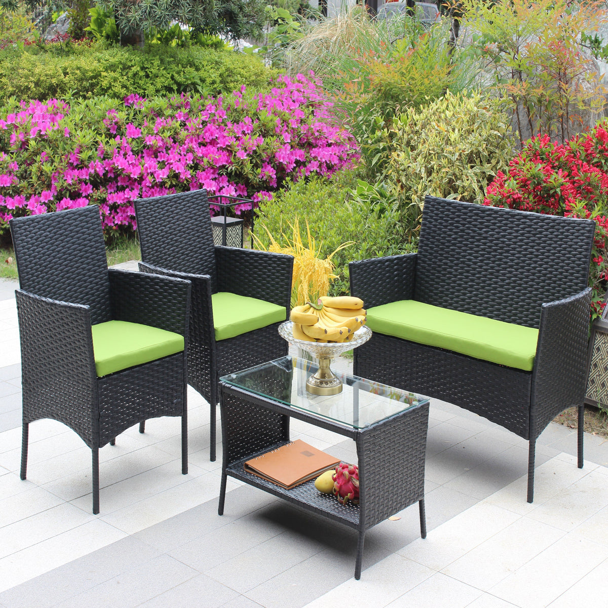 4 pc rattan patio furniture set with wicker seating and lime green cushions on Tampa Home & Garden Store