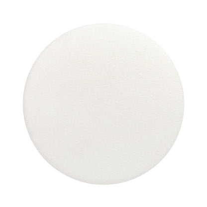 Round white upholstered storage ottoman with textured fabric, top-down view on Tampa Home & Garden Store