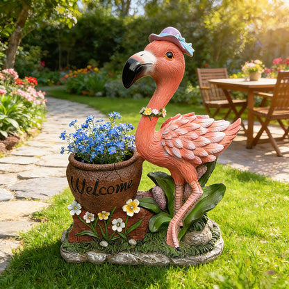 Outdoor flamingo flower pot planter statue in pink with floral accents on Tampa Home & Garden Store