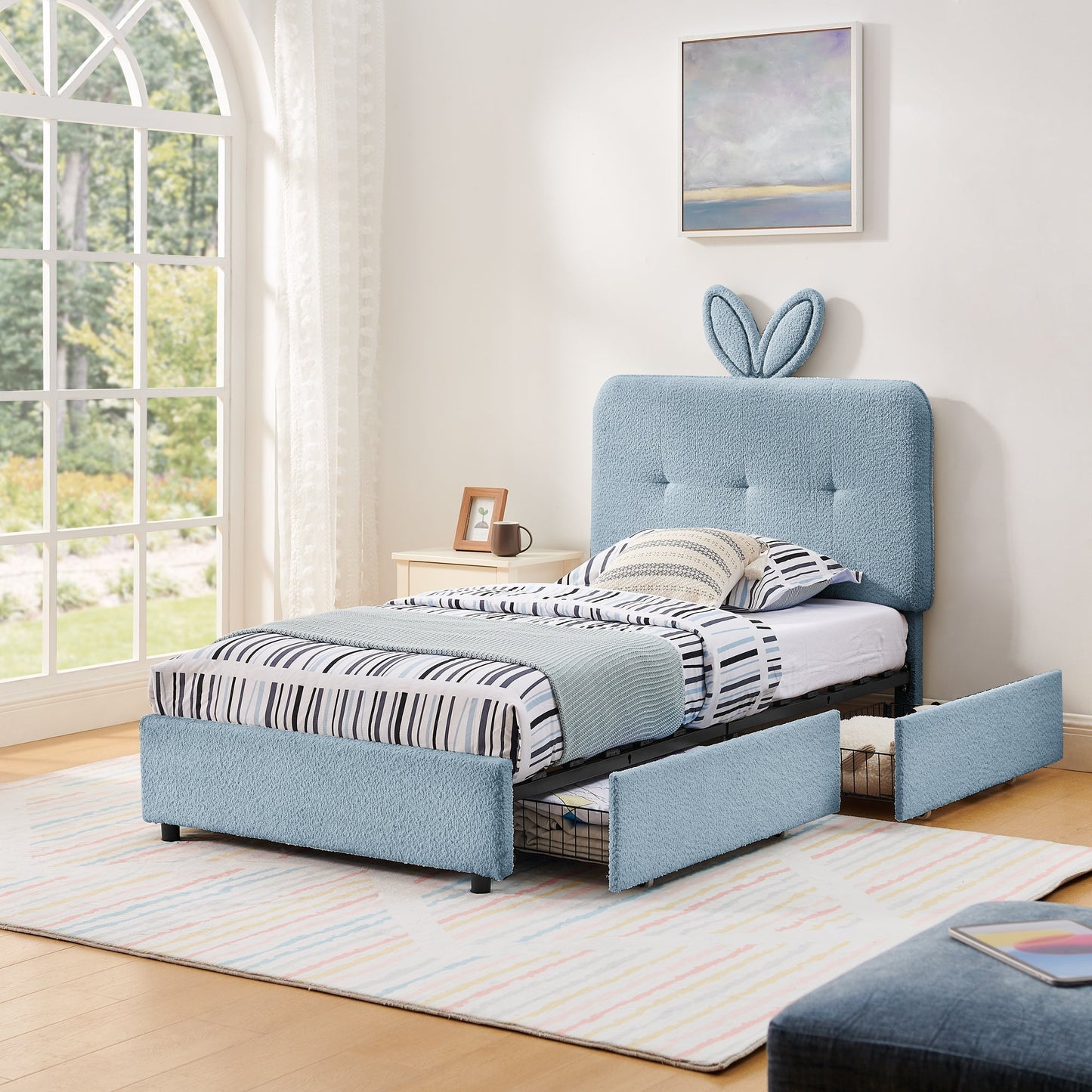Twin size kids upholstered bed with oversized rabbit ear headboard in blue textured fabric on Tampa Home & Garden Store