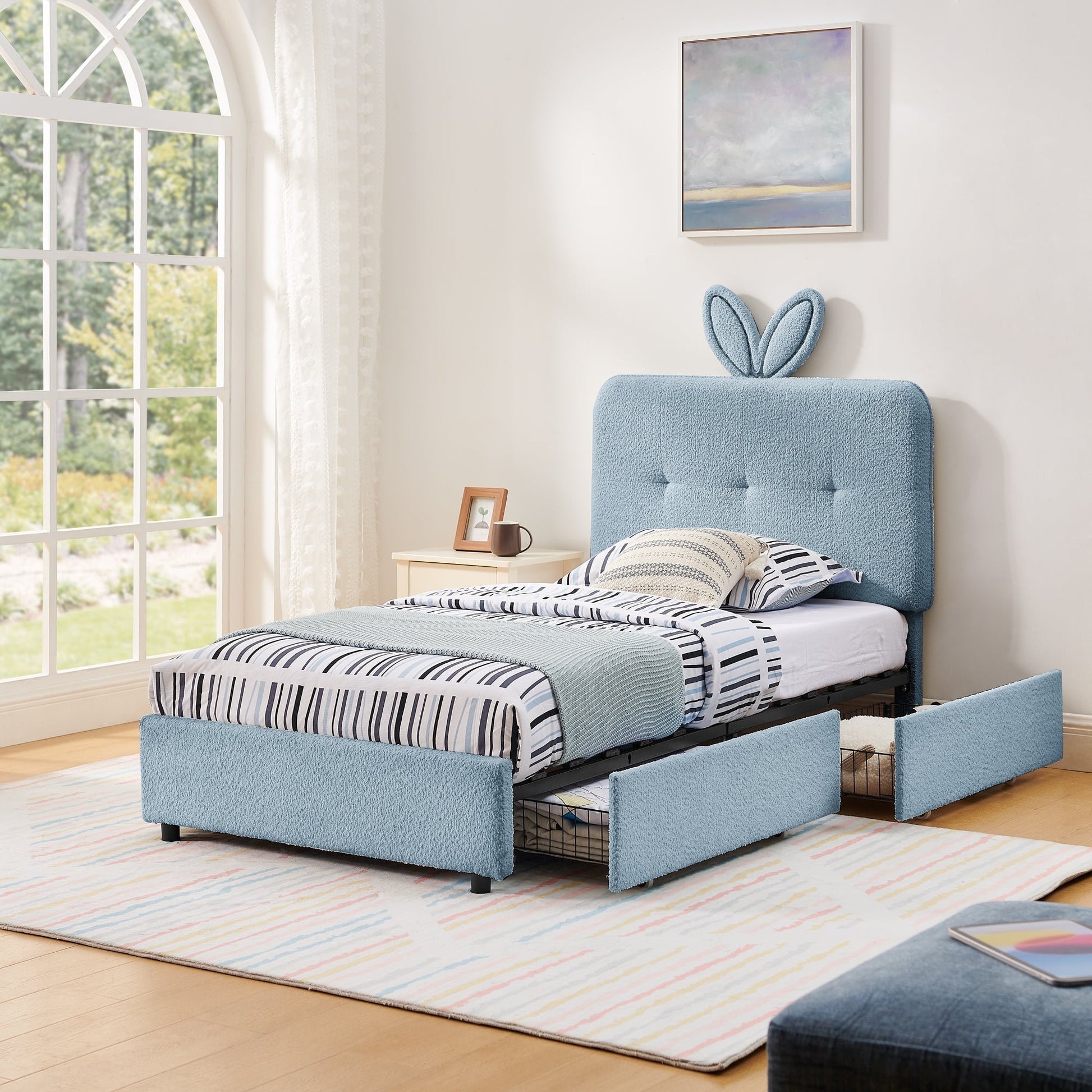 Twin size kids upholstered bed with oversized rabbit ear headboard in blue textured fabric on Tampa Home & Garden Store