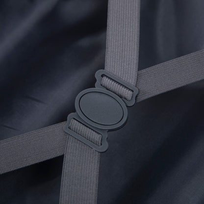 Luggage strap hardware with grey nylon webbing and ABS wheel housing on dark fabric background on Tampa Home & Garden Store