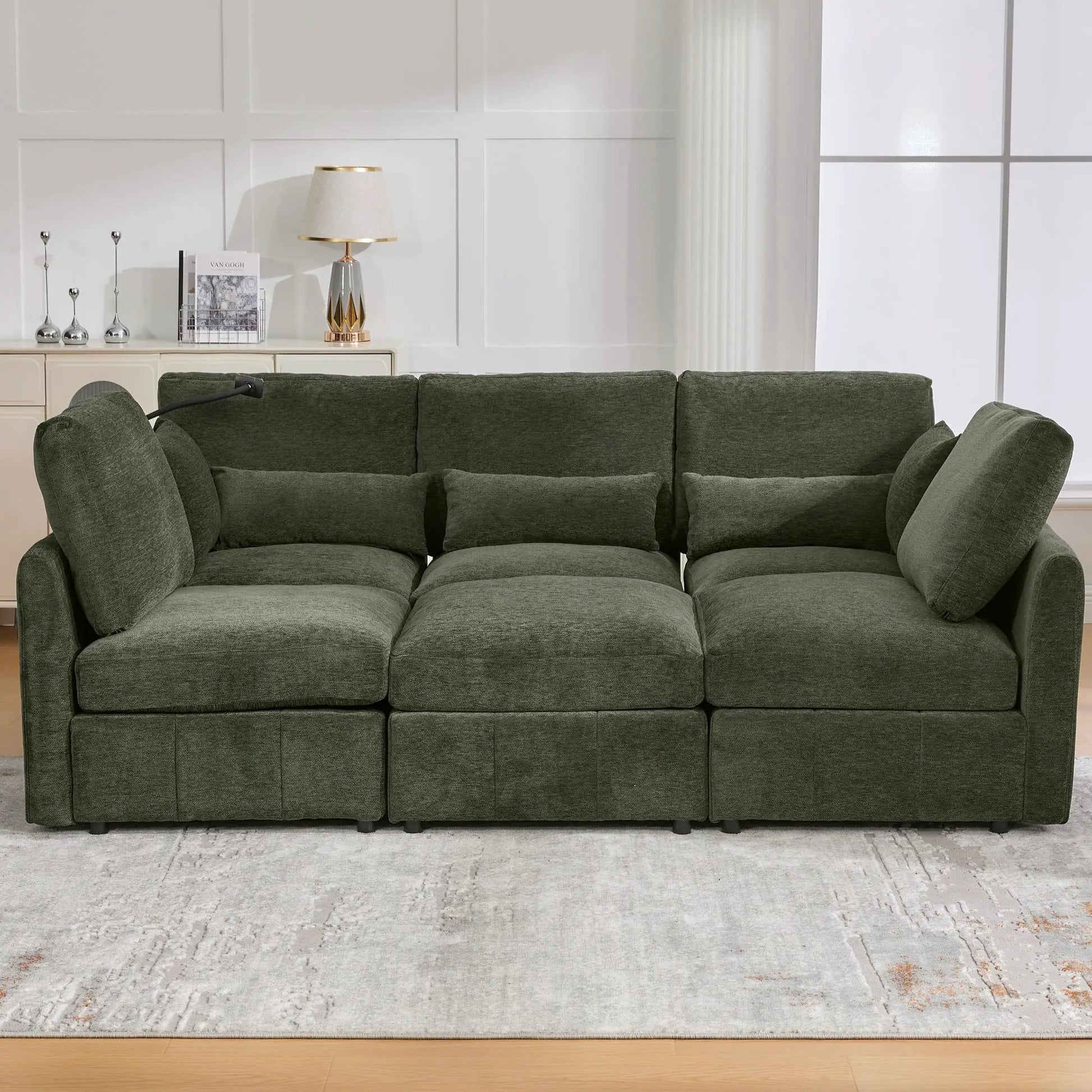 Modular dark green sofa with plush cushions and low-profile arms on Tampa Home & Garden Store