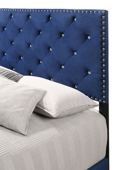 Luxurious upholstered bed in blue velvet with diamond tufting and crystal studs on Tampa Home & Garden Store