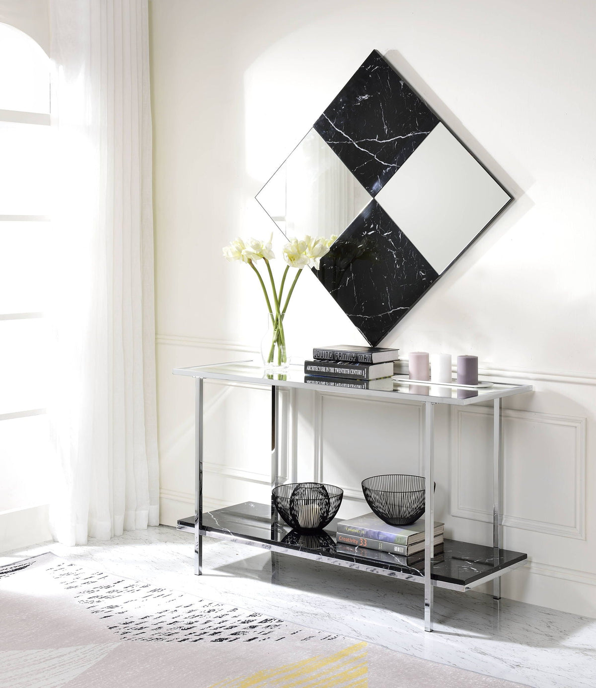 Mirrored faux marble console table with black veined panels in a diamond frame and chrome legs on Tampa Home & Garden Store