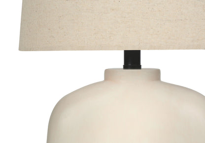 Table lamp cream resin with beige fabric shade and black stem by HouseOfZazla on Tampa Home & Garden Store