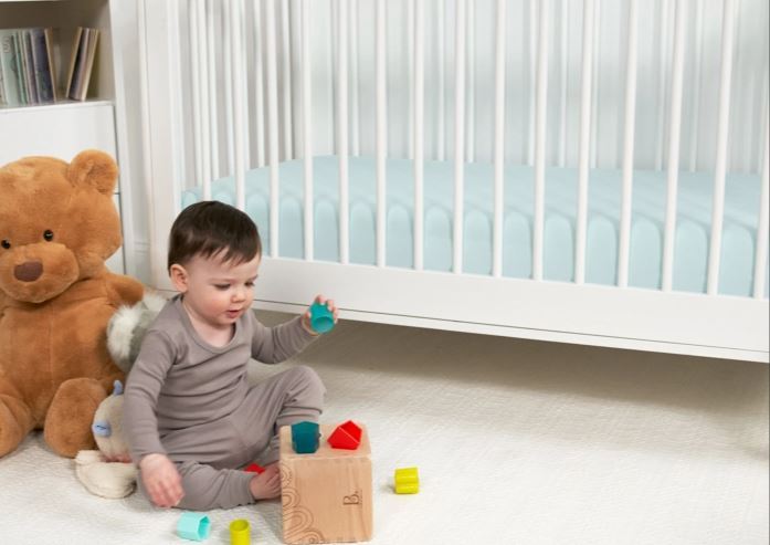 BedGear Dri-Tec Crib Sheet Baby Blue by HouseOfZazla in a nursery with toys and teddy bear on Tampa Home & Garden Store