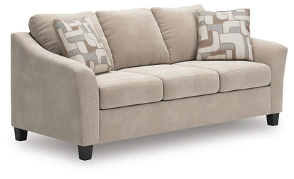 Willarae sofa beige stationary sofa with 2 geometric-pattern pillows by Unique Piece Furniture on Tampa Home & Garden Store