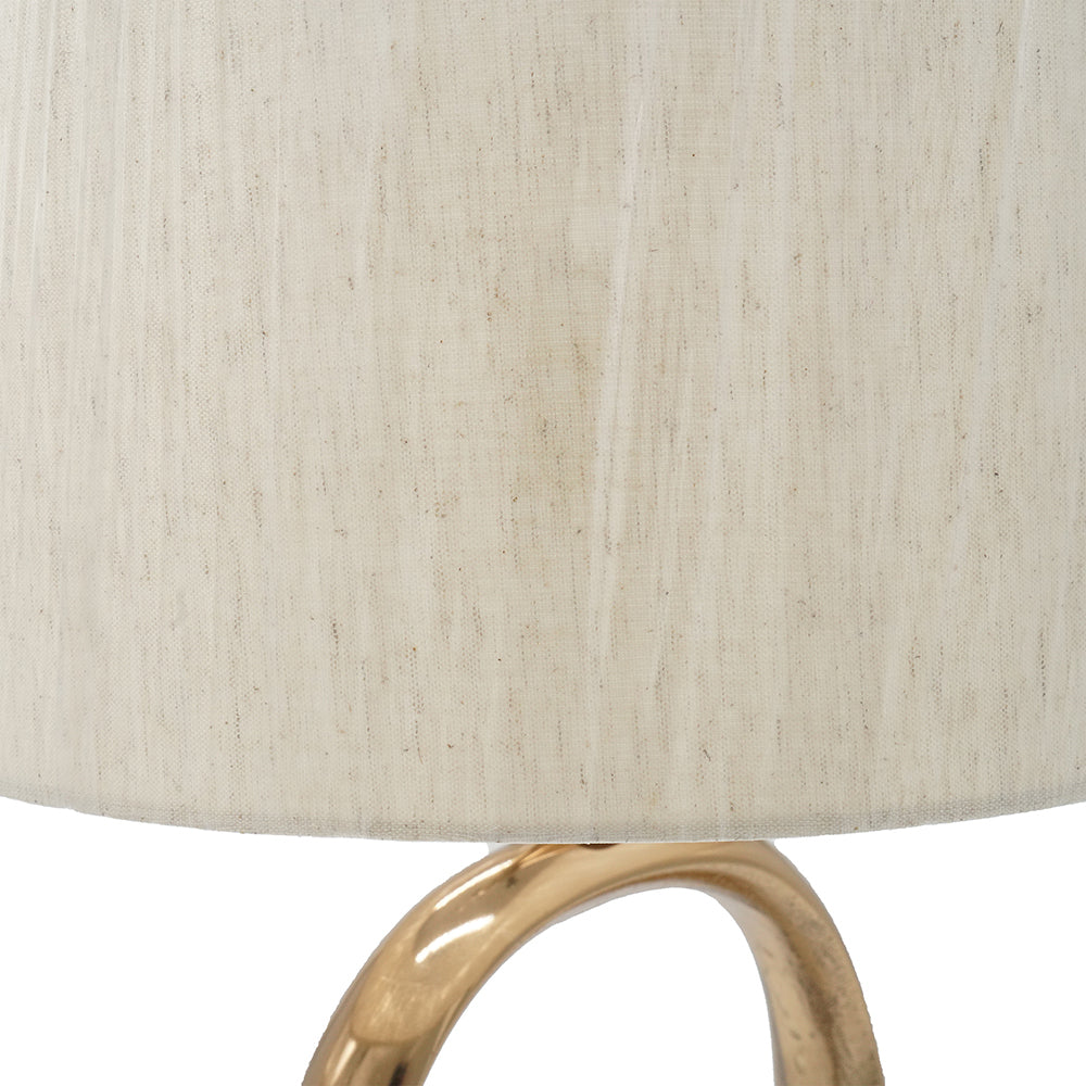 D14x28.5' Oval Shape Cut Out Metal Table Lamp with Cream Linen Shade, gold curved base on Tampa Home & Garden Store