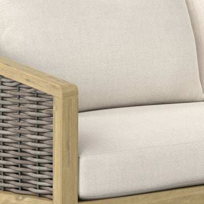 Parkside outdoor sofa with natural wood frame and beige fabric cushions, wicker side panel on Tampa Home & Garden Store