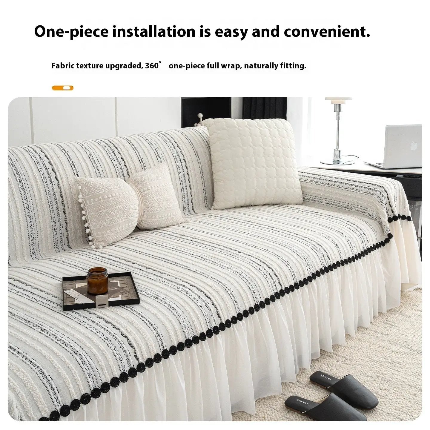 Striped sofa cover with white pleated skirt and black pom-pom trim, beige cushions on a sofa on Tampa Home & Garden Store