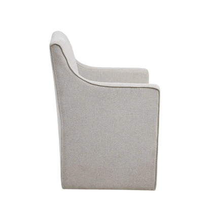 Traditional skirted dining arm chair with light beige textured fabric and curved arms on Tampa Home & Garden Store