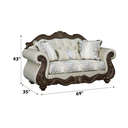Pierce loveseat with 3 beige pillows and ornate cherry wood frame on Tampa Home & Garden Store