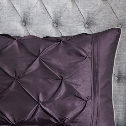 7 Piece Tufted Comforter Set on a King Bed