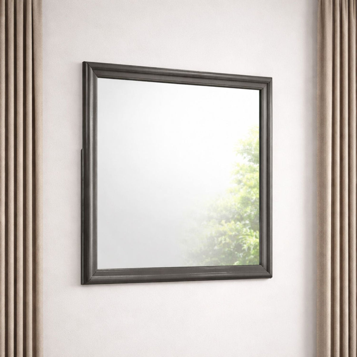 Rectangular wall mirror with smooth dark gray frame on a beige wall beside taupe curtains on Tampa Home & Garden Store