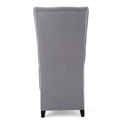 Upholstered dining chair back view in gray fabric with dark tapered legs on Tampa Home & Garden Store