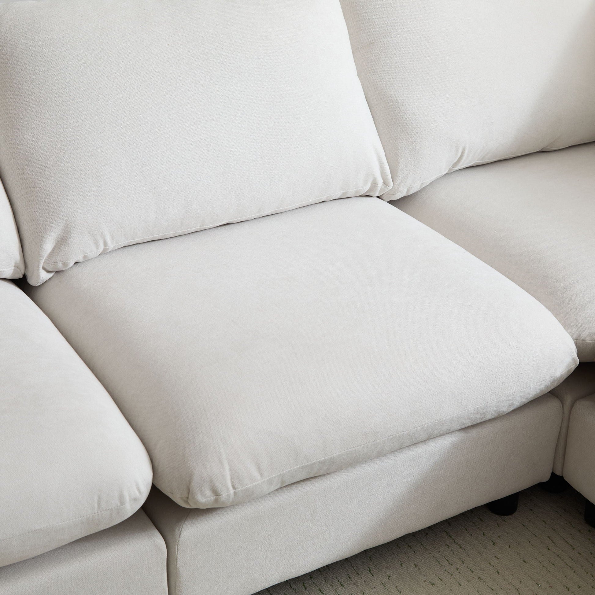 Modular Free Combination Sectional Sofa Couch cushions in light beige fabric closeup on Tampa Home & Garden Store