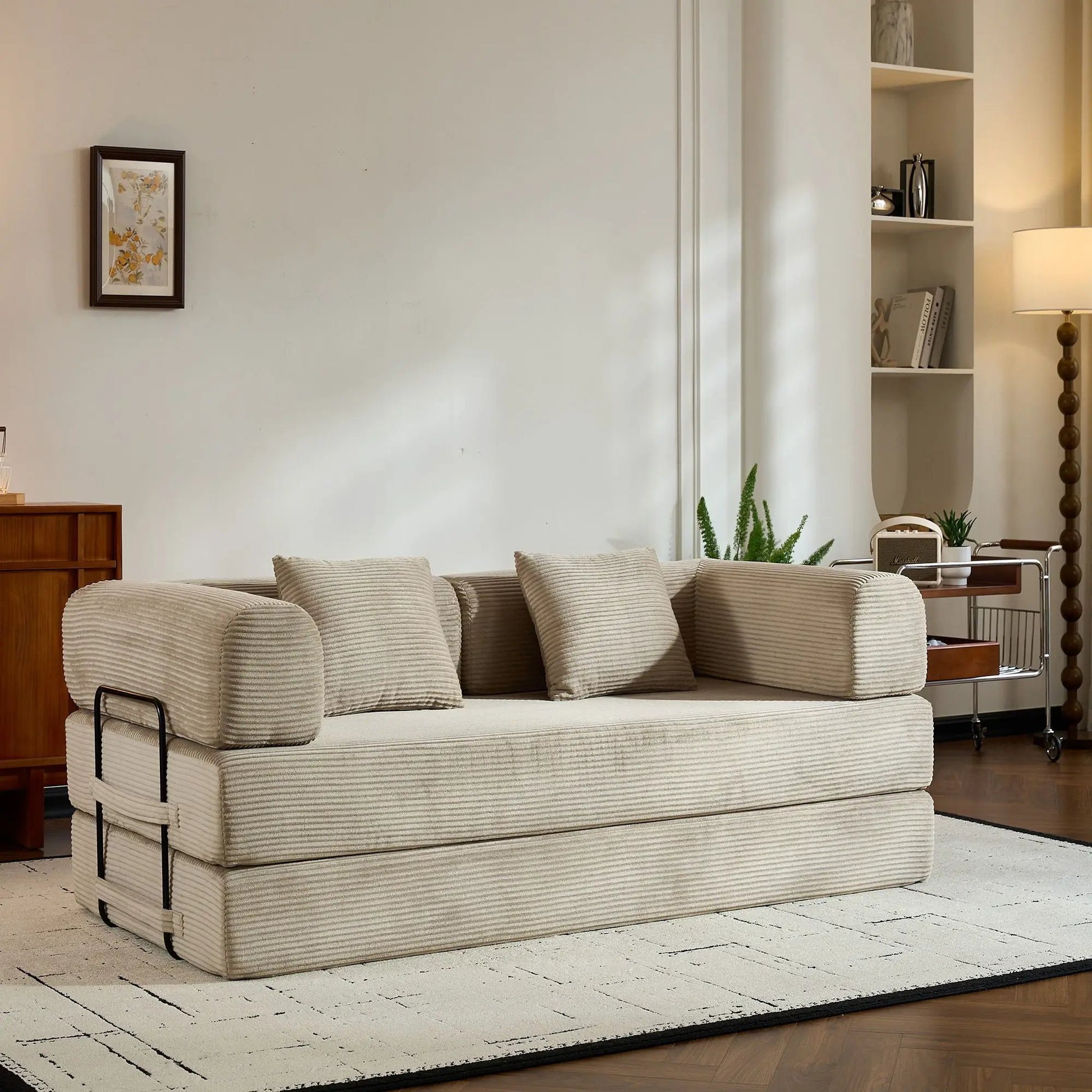 Convertible sleeper sofa in beige ribbed fabric with fixed frame and plush cushions on Tampa Home & Garden Store