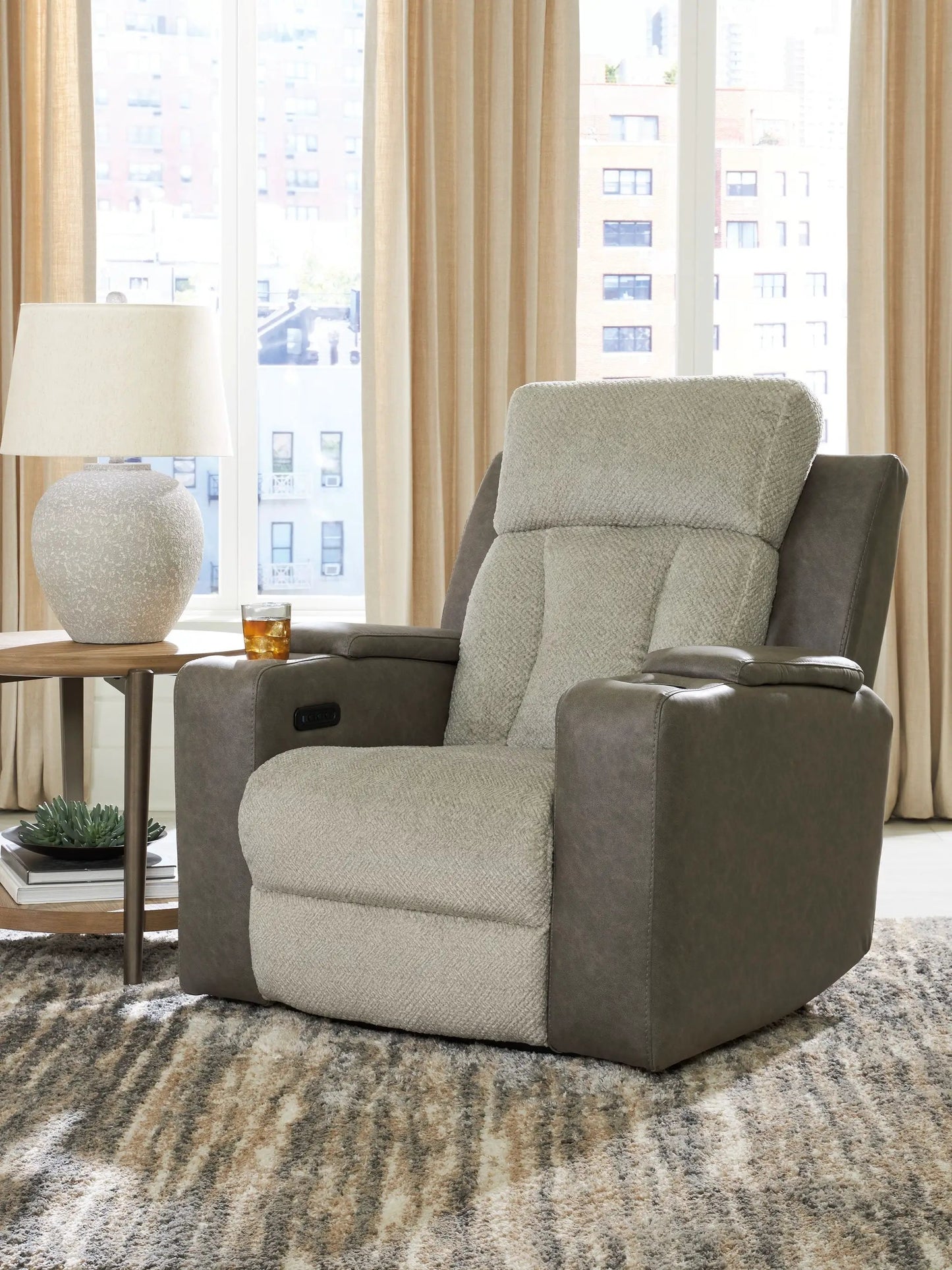 WhipLash power recliner with adjustable headrest in sisal fabric in a cozy living room on Tampa Home & Garden Store