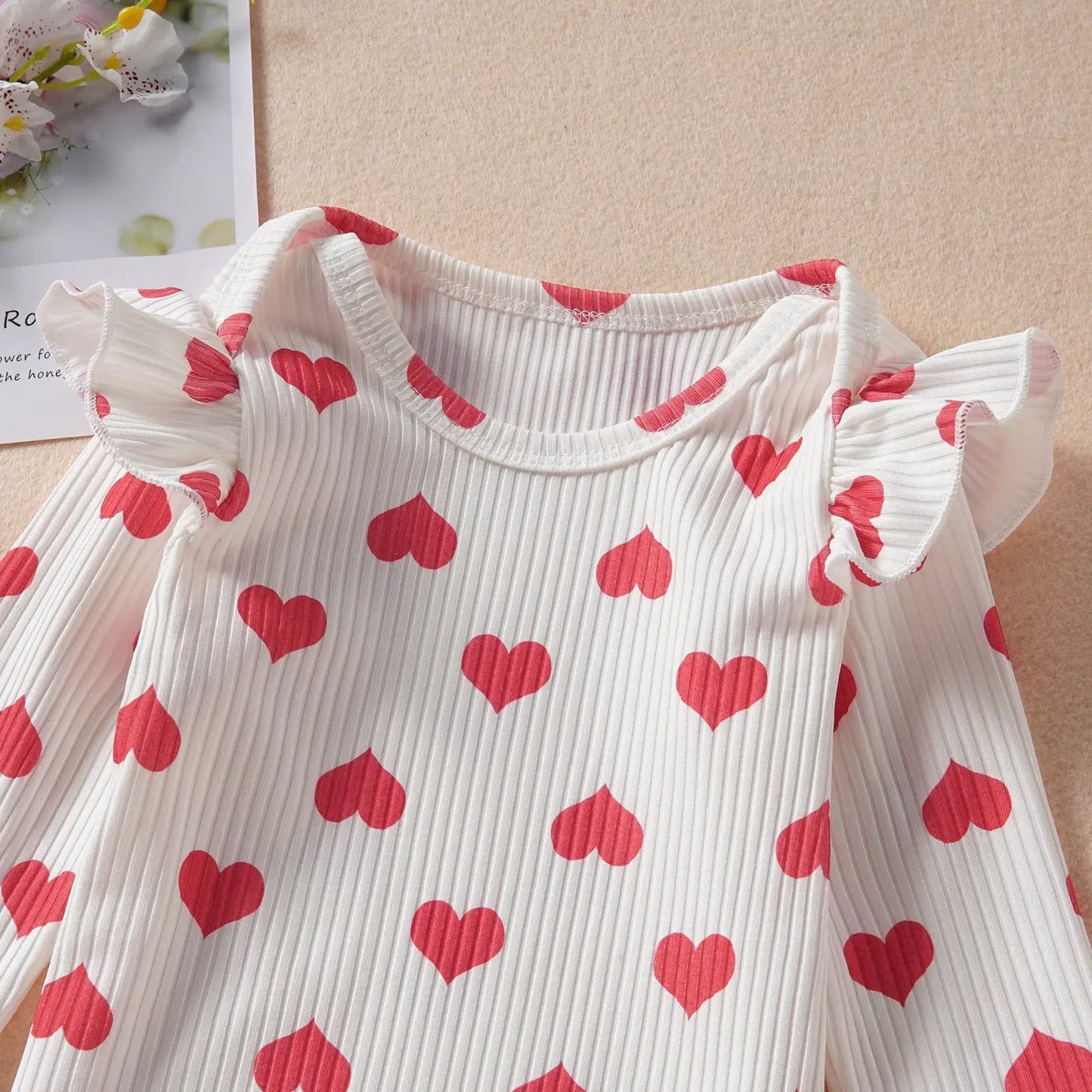 Infant white love top with red hearts, ribbed fabric and ruffled sleeves, two-piece set on Tampa Home & Garden Store