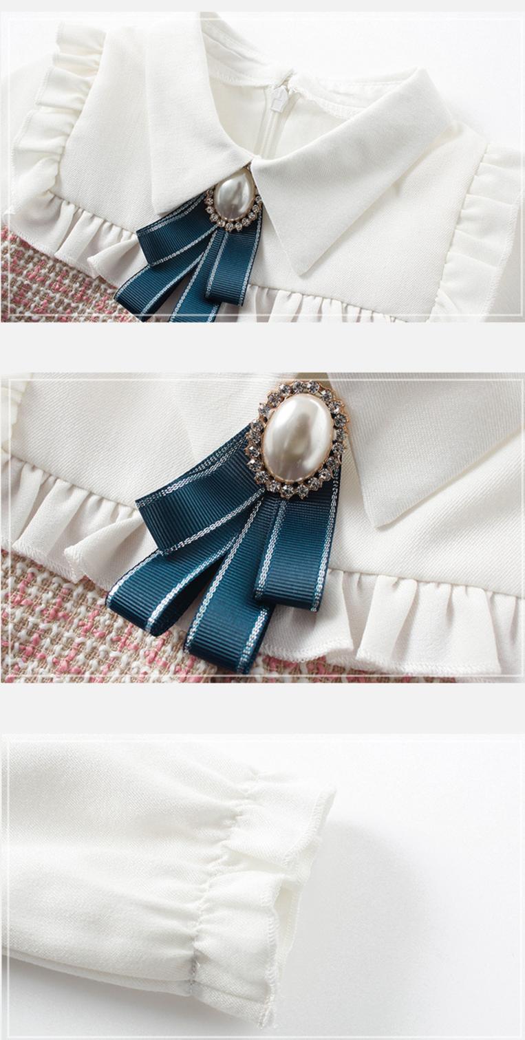 Stevvex white baby dress with collar, navy ribbon bow with pearl center and lantern sleeves on Tampa Home & Garden Store