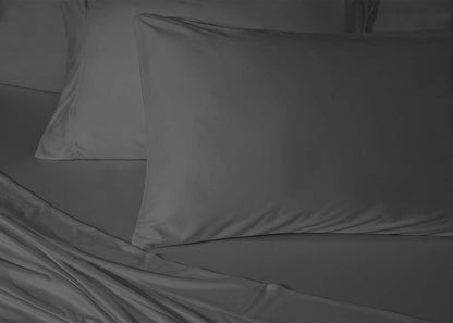 BedGear Dri-Tec Queen Pillowcase Set by HouseOfZazla in charcoal gray on bed with sheets on Tampa Home & Garden Store