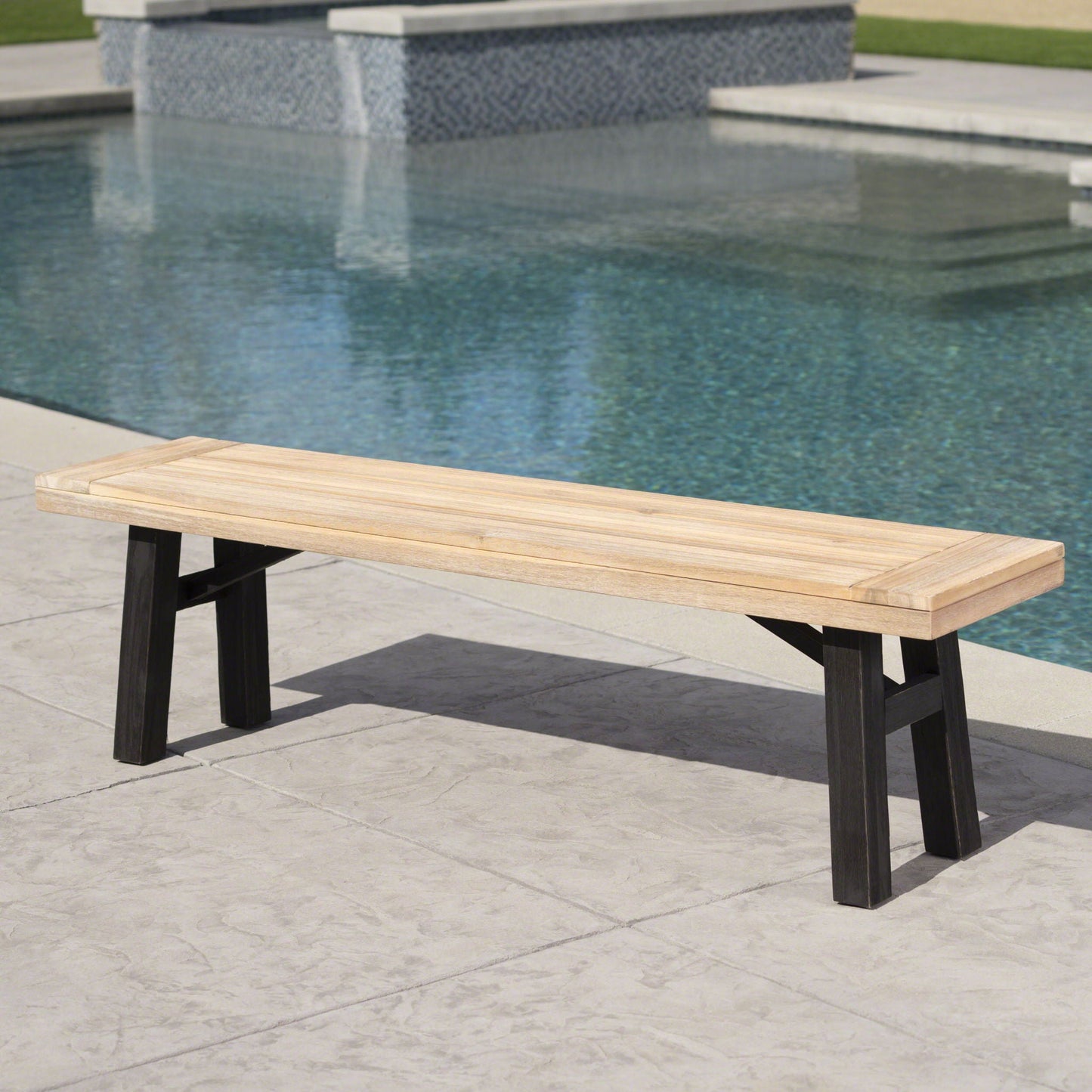 Outdoor bench with slat panel design and acacia wood frame by HouseOfZazla poolside on Tampa Home & Garden Store