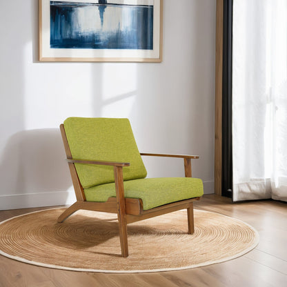 Genuine lounge chair with solid wood frame and green fabric in a bright room on Tampa Home & Garden Store