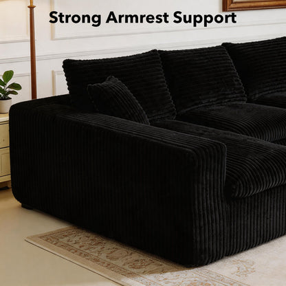 Modular sectional cloud couch by HouseOfZazla in black corduroy with plush cushions on beige rug on Tampa Home & Garden Store