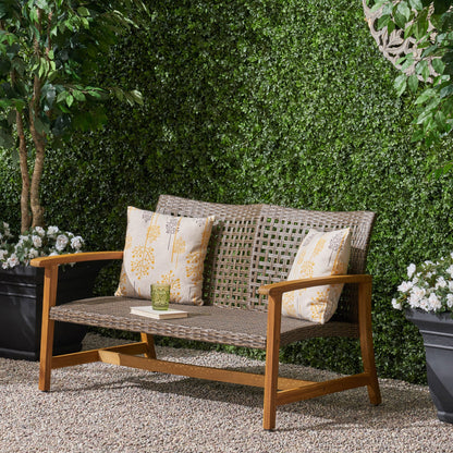 Hampton Outdoor Acacia Wood Wicker Loveseat by HouseOfZazla with beige botanical cushions on Tampa Home & Garden Store
