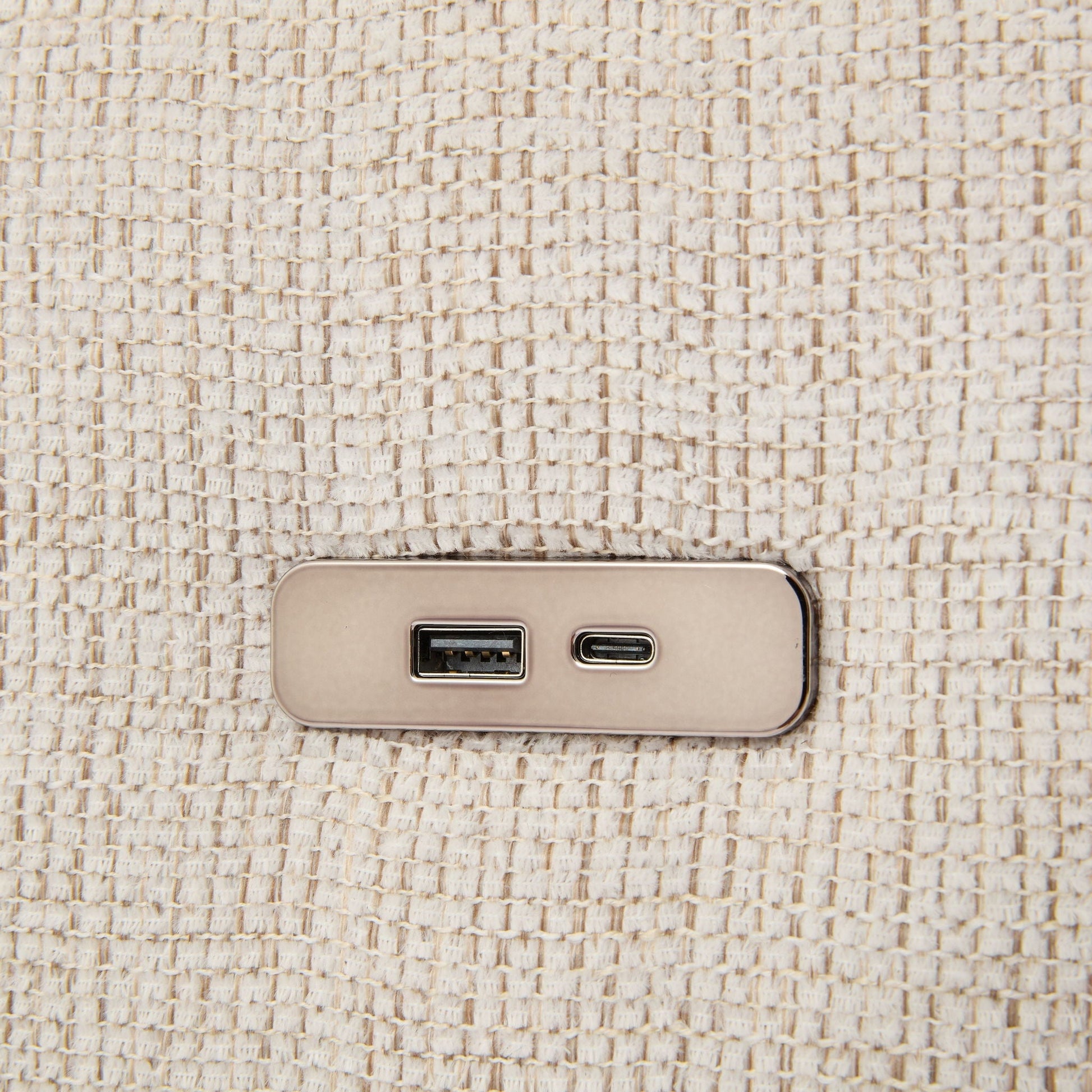 Sectional sofa beige woven upholstery close-up showing textured fabric and metal USB outlet on Tampa Home & Garden Store