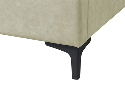 Fully upholstered bed by Unique Piece Furniture with beige fabric and black legs on Tampa Home & Garden Store