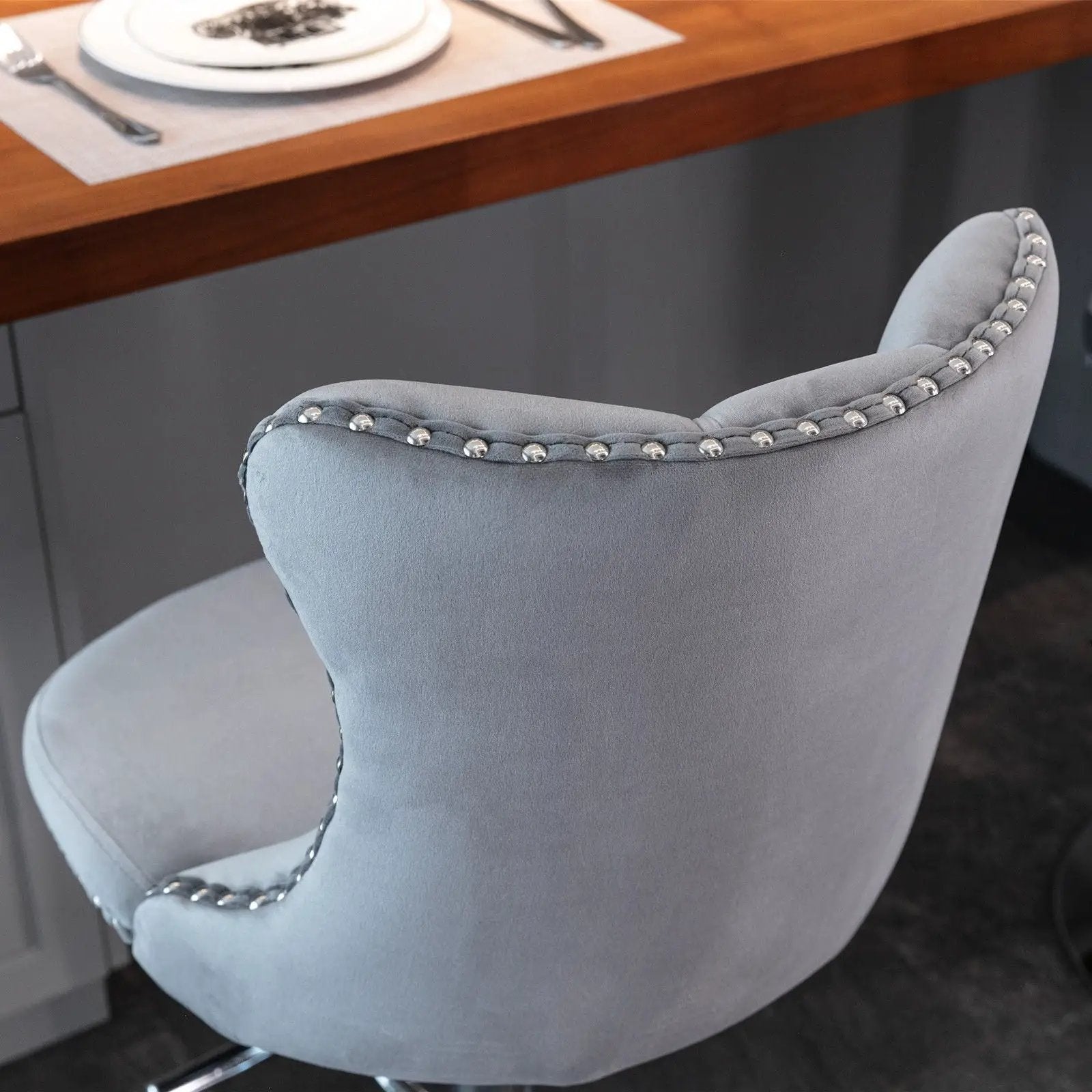 Swivel barstool set of 2 in light gray upholstery with chrome base and nailhead trim on Tampa Home & Garden Store