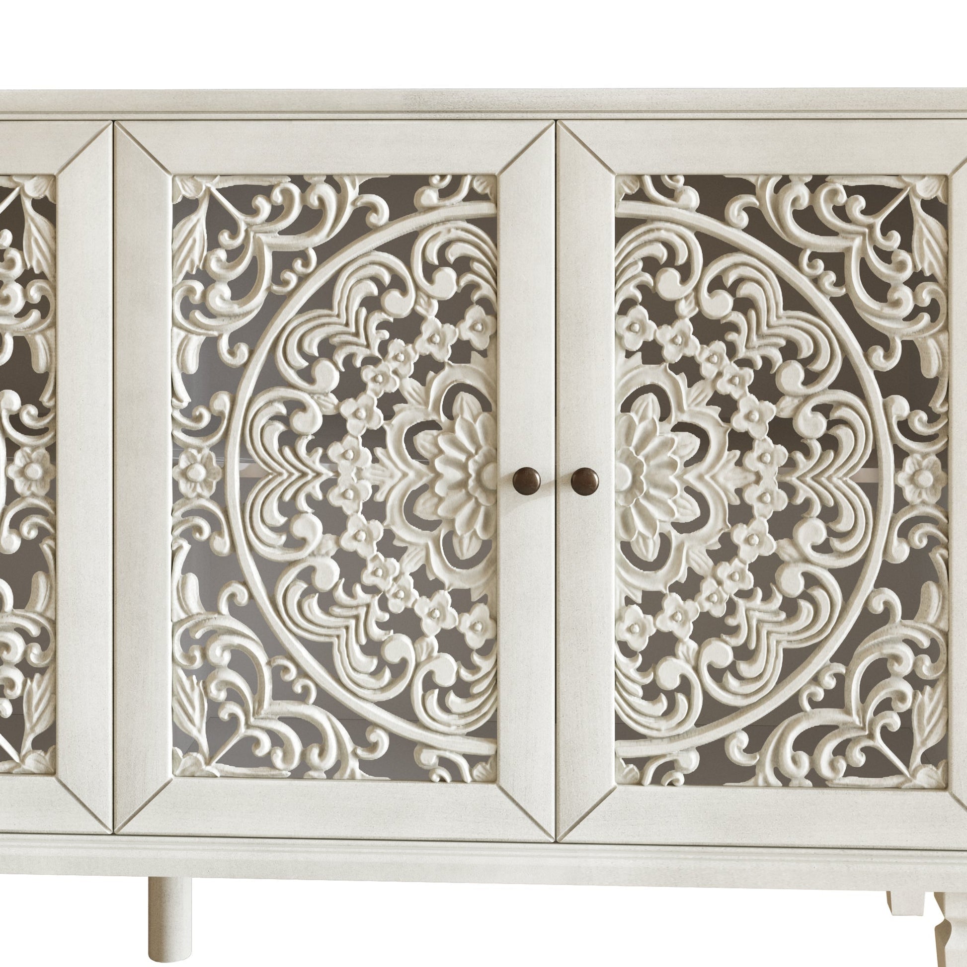 Antique white buffet cabinet with ornate floral carved panels and solid wood legs on Tampa Home & Garden Store