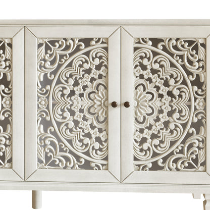 Antique white buffet cabinet with ornate floral carved panels and solid wood legs on Tampa Home & Garden Store