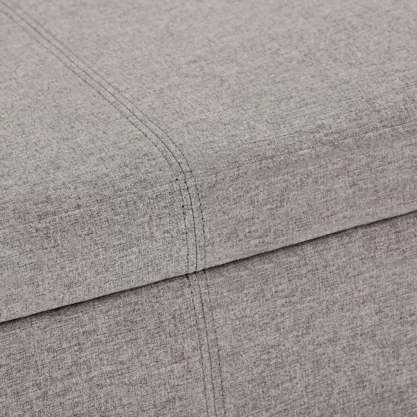 Avalon storage ottoman bench by Unique Piece Furniture in light gray upholstery close-up on Tampa Home & Garden Store