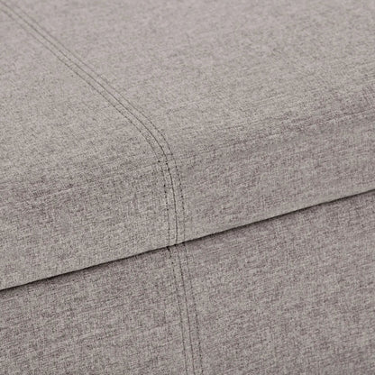 Avalon storage ottoman bench by Unique Piece Furniture in light gray upholstery close-up on Tampa Home & Garden Store