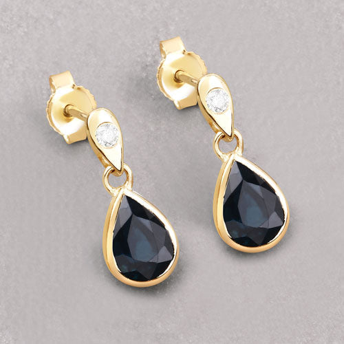 Pair of 1.65ct blue sapphire teardrop earrings with white diamonds in 10K yellow gold on Tampa Home & Garden Store