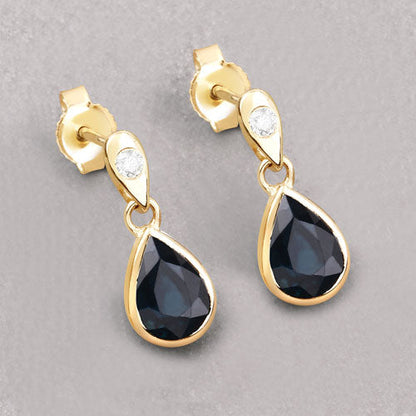 Pair of 1.65ct blue sapphire teardrop earrings with white diamonds in 10K yellow gold on Tampa Home & Garden Store