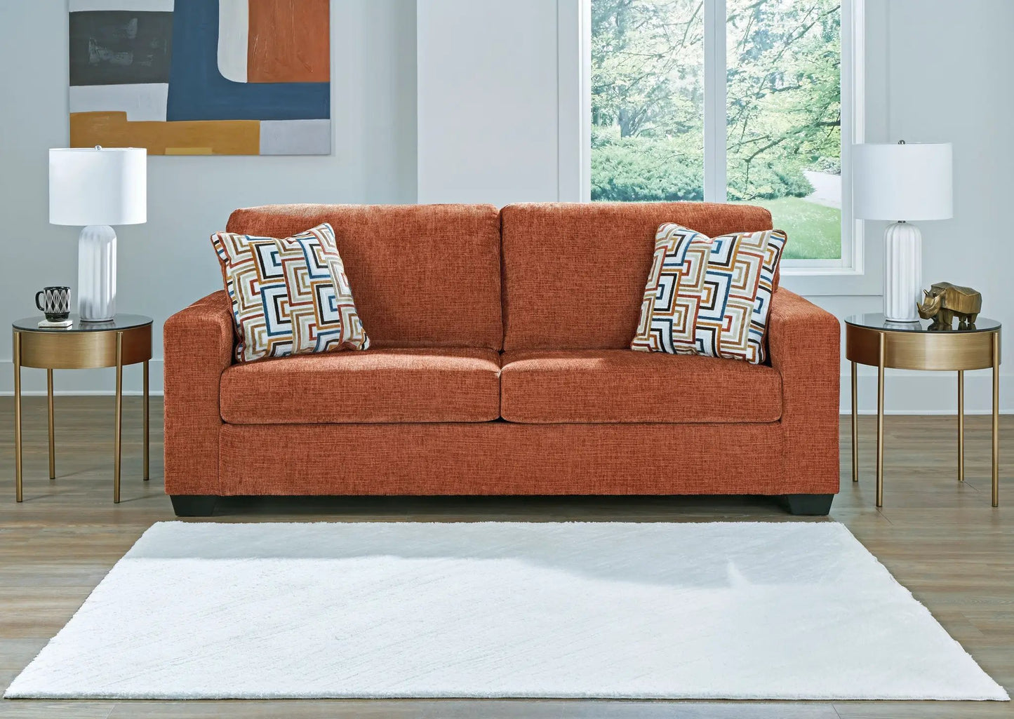 Aviemore sofa in orange fabric with geometric cushions by Unique Piece Furniture on Tampa Home & Garden Store