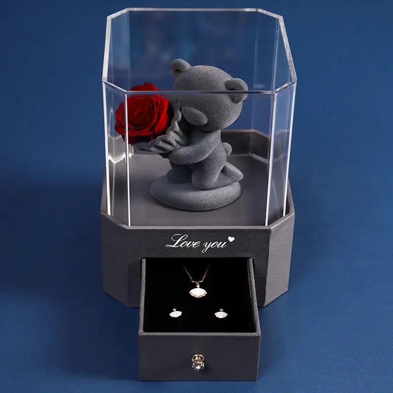Flocking gray bear with red rose in a clear lid gift box; jewelry drawer shows necklace and earrings on Tampa Home & Garden Store