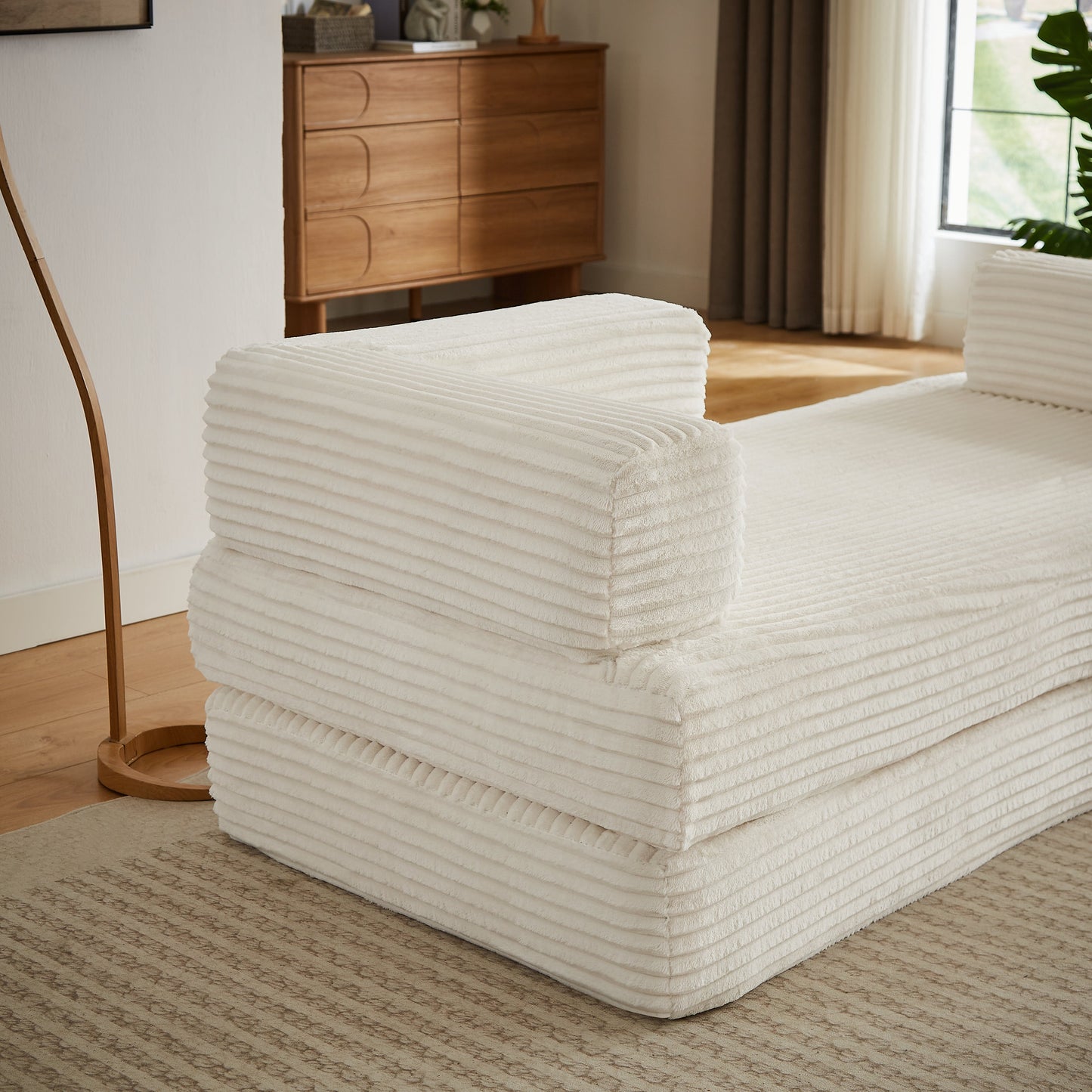 HouseOfZazla Loveseat Sofa with oversized white ribbed cushions in a stylish living space on Tampa Home & Garden Store