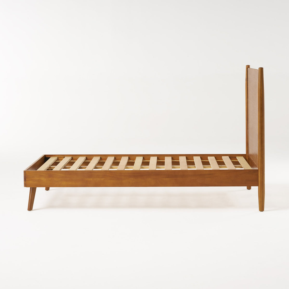 Cohron Solid Wood Platform Bed Twin by HouseOfZazla, warm wood finish, slatted base, angled legs on Tampa Home & Garden Store