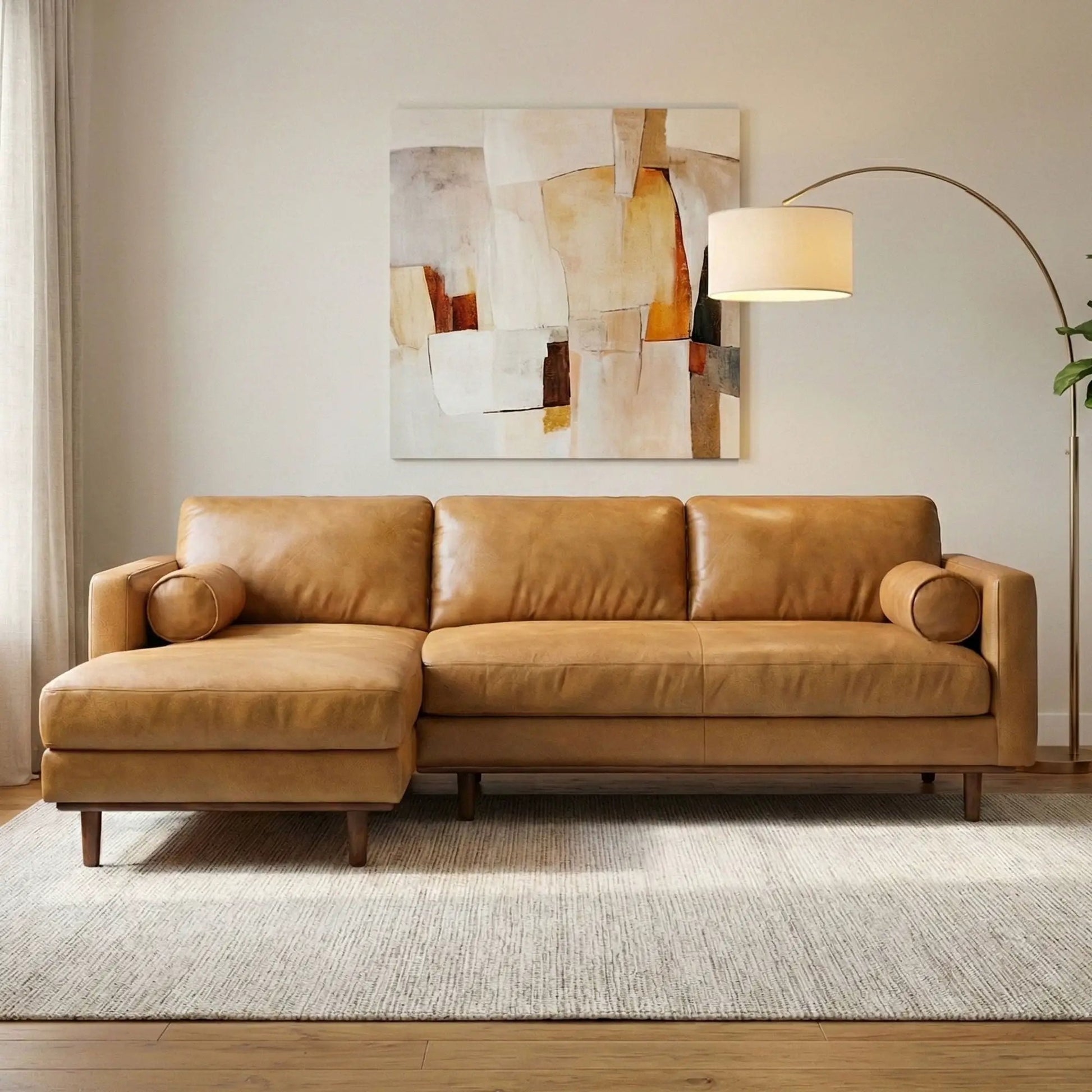 Morrison upholstered stationary sectional sofa in tan leather with chaise extension on Tampa Home & Garden Store