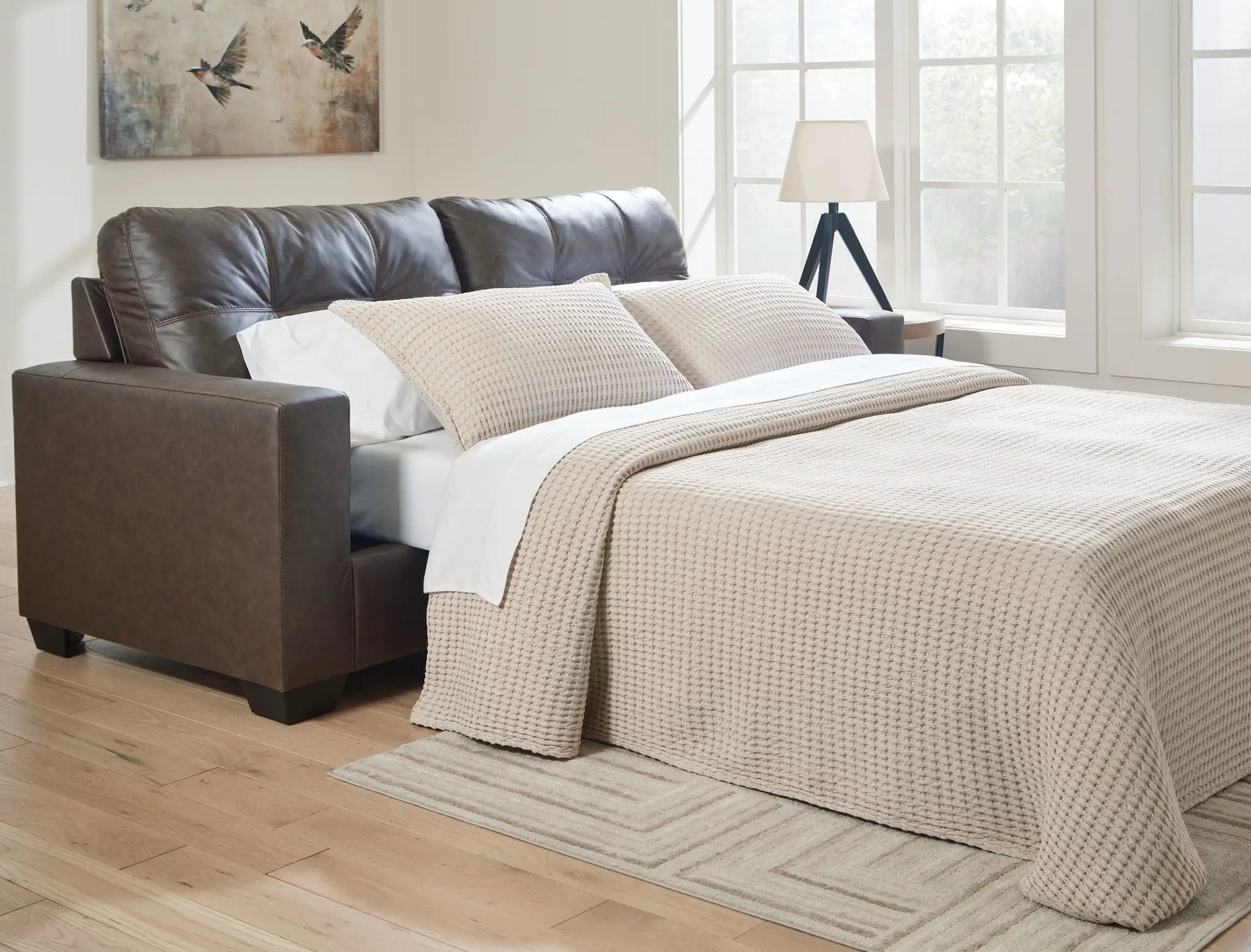 Barlin Mills sofa sleeper in brown leather with beige knit throw by Unique Piece Furniture on Tampa Home & Garden Store
