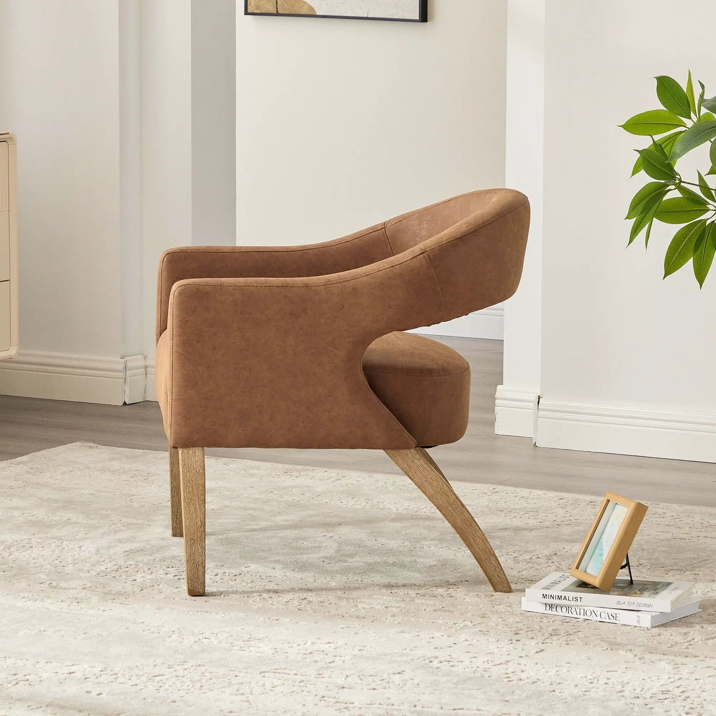 Upholstered open-back armchair with weathered rubberwood legs in brown by Unique Piece Furniture on Tampa Home & Garden Store