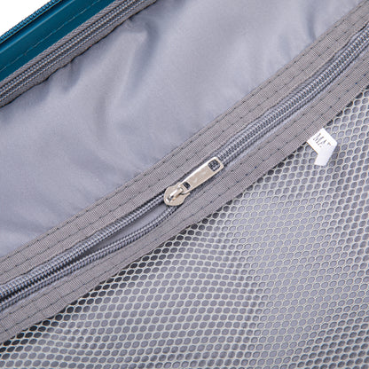 HouseOfZazla hard case luggage interior close-up with gray lining and blue zipper trim on Tampa Home & Garden Store