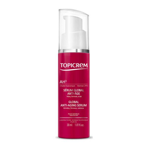 Topicrem AH3 Global face serum bottle with white pump on pink label on Tampa Home & Garden Store