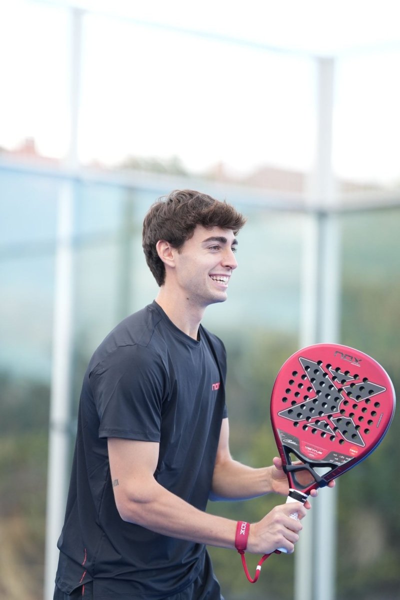 Padel racket NOX EA10 Ventus Hybrid 12K Xtreme, red with black star perforations on Tampa Home & Garden Store