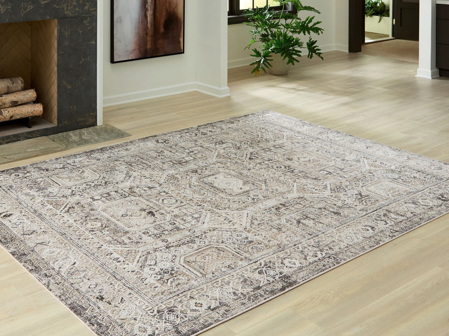 Junley rug from Unique Piece Furniture with beige-gray distressed oriental pattern on Tampa Home & Garden Store